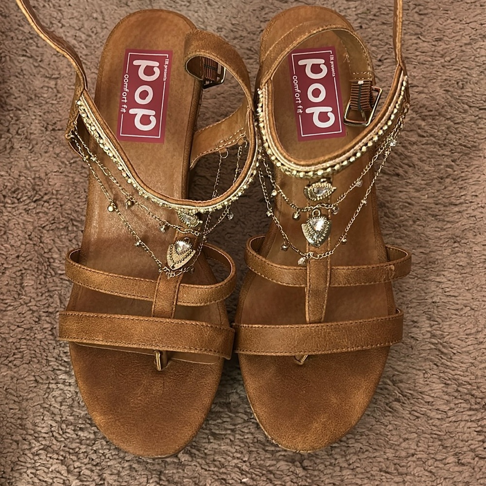 brown heels with charms on the front